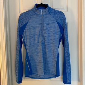 Athleta ladies blue half zip top for the gym or anywhere.